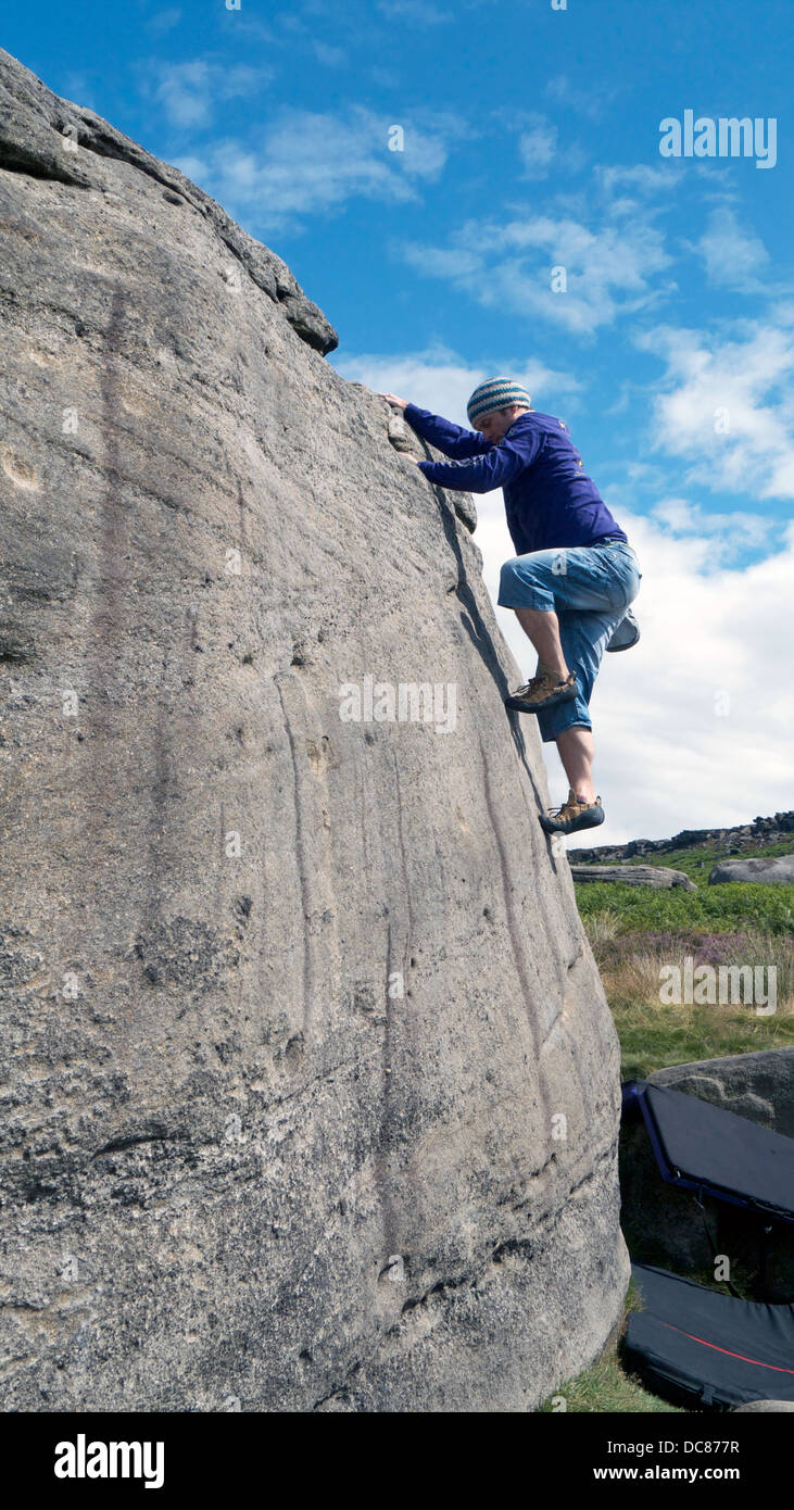 rock climber bouldering at Burbage Edge South, Derbyshire, Peak District National Park, England, UK, United, Kingdom, Great, Bri Stock Photo