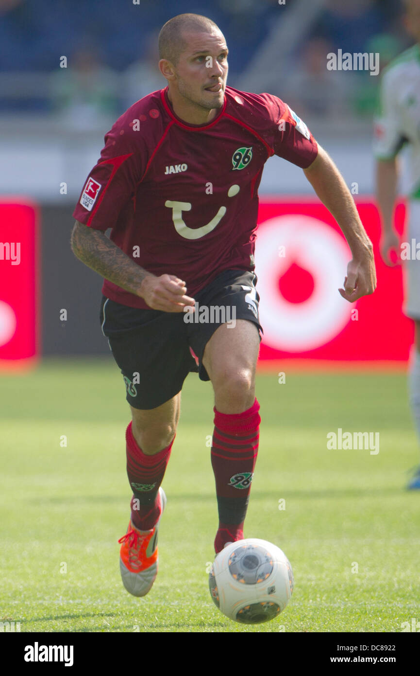 Hannover's Leon Andreasen plays the balll during the Bundesliga soccer match between Hannover 96 and VfL Wolfsburg at HDI-Arena in Hanover, Germany, 10 August 2013. Photo: Sebastian Kahnert Stock Photo