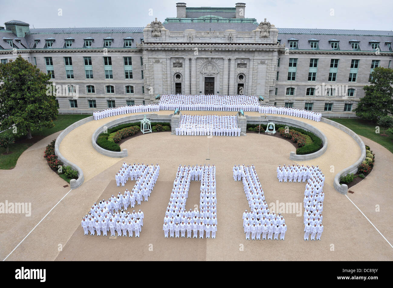 Incoming Midshipman known as plebes stand in formation for a class picture at the US Naval Academy July 9, 2013 in Annapolis, Maryland. Stock Photo