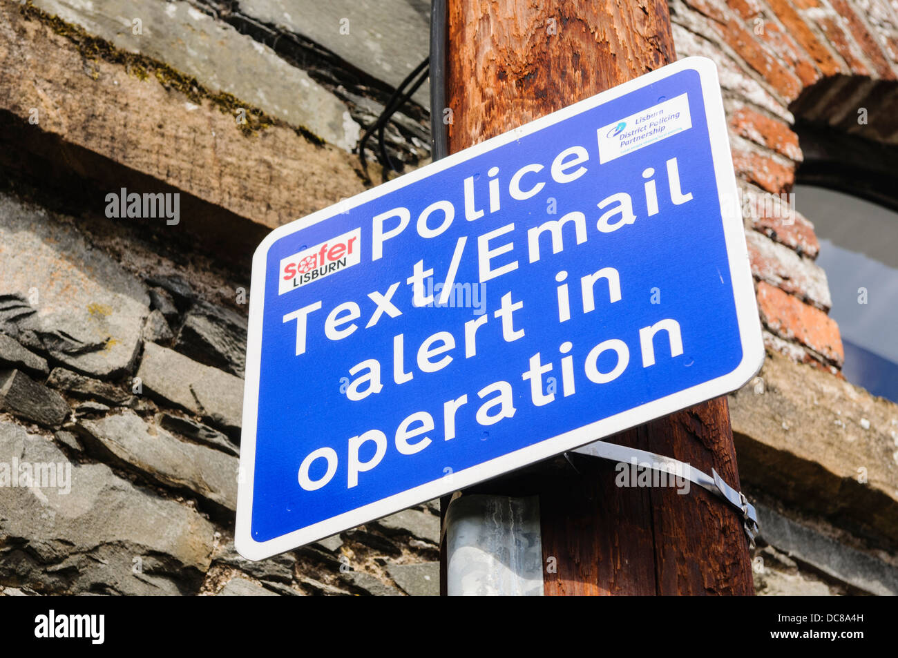 Sign warning public that 'Police Text/Email alert in operation' Stock Photo