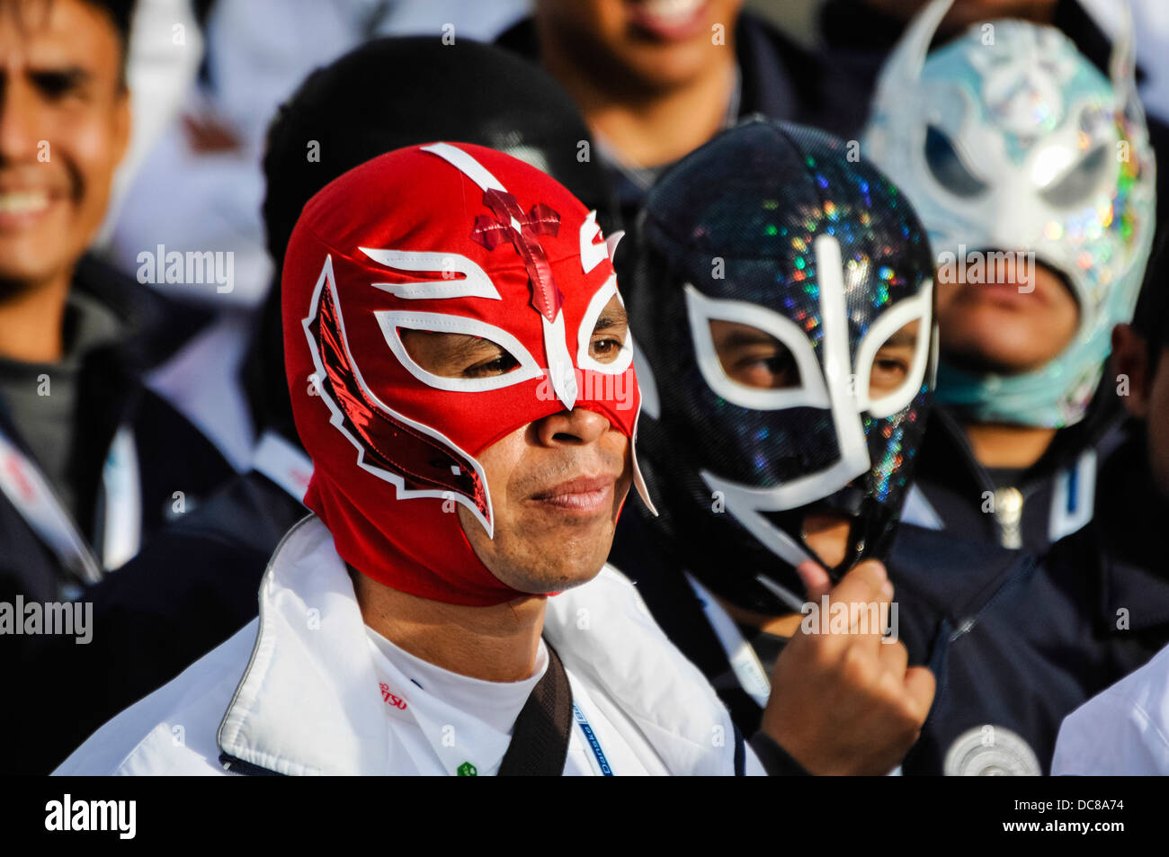 Men wearing Mexican wrestler masks Stock Photo