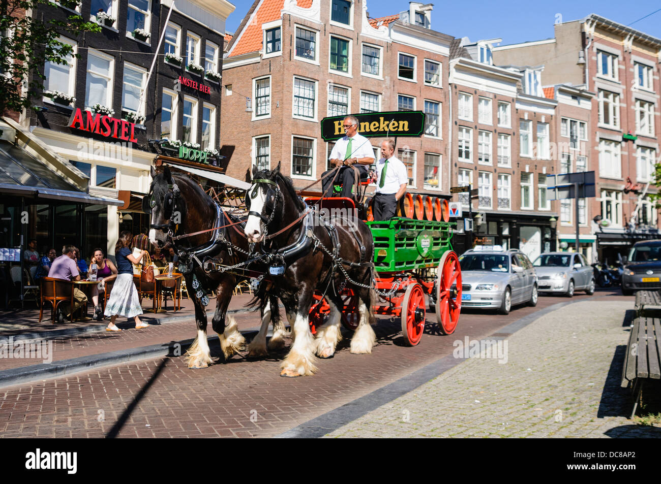 A horsedrawn carriage from the Heineken Brewery in Amsterdam being pulled along Spui. Stock Photo