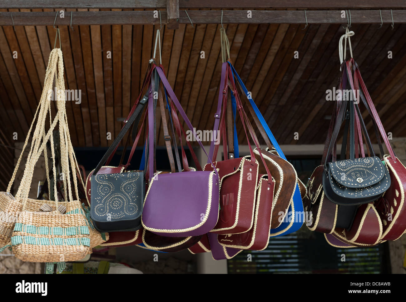 Handbags display on open street market shop Stock Photo