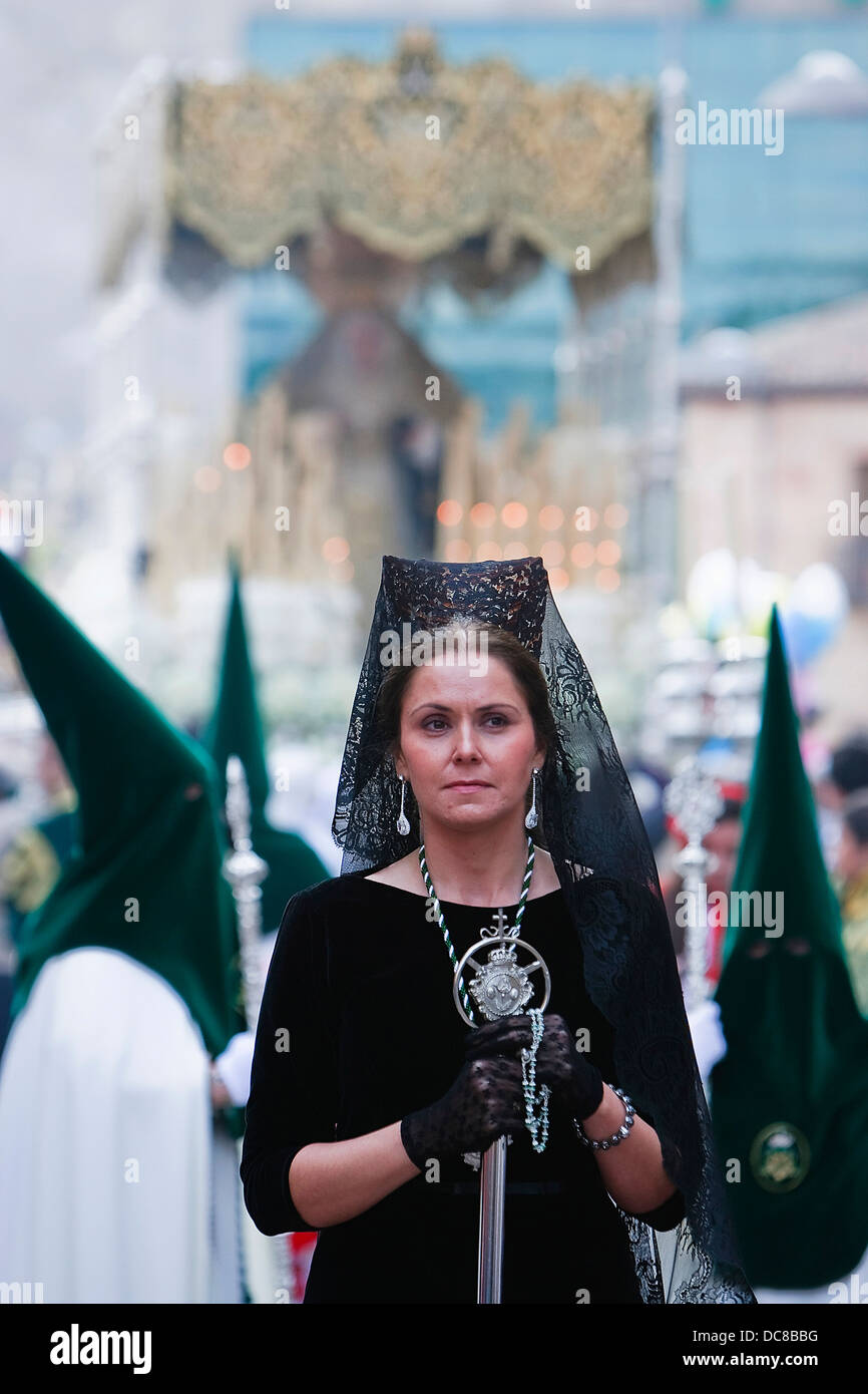 https://c8.alamy.com/comp/DC8BBG/woman-dressed-in-mantilla-during-a-procession-of-holy-week-andalusia-DC8BBG.jpg