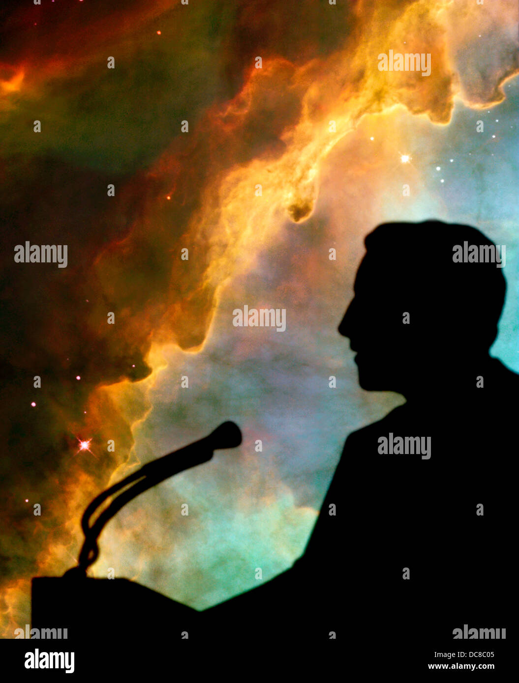 NASA Hubble view of Omega/Swan Nebula galaxy with computer generated image of man speaking on podium Stock Photo