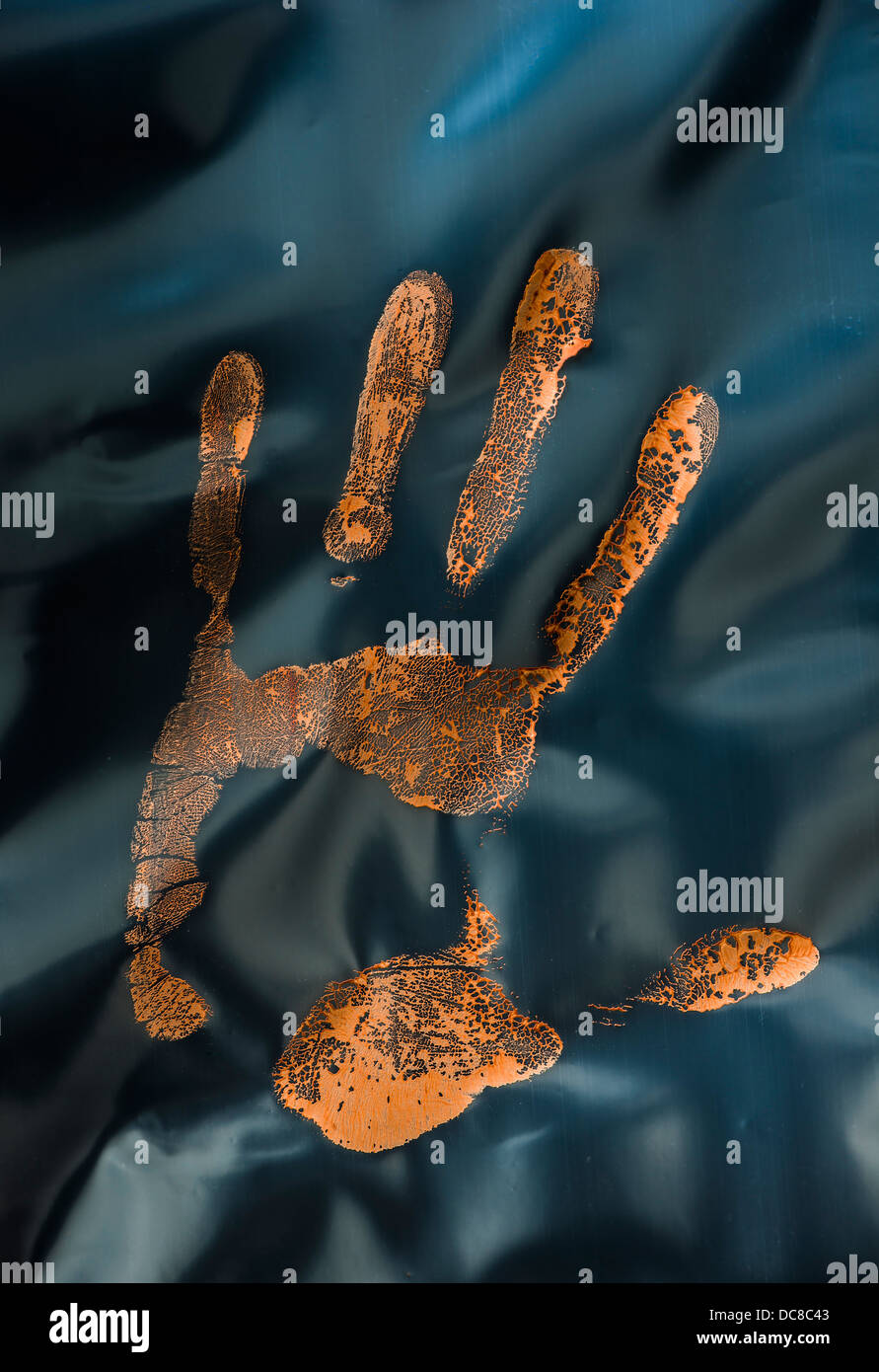 Handprint made with red paint on plastic Stock Photo Alamy