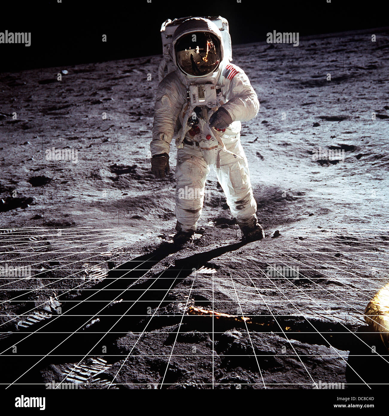 NASA astronaut standing on moon with perspective grid Stock Photo