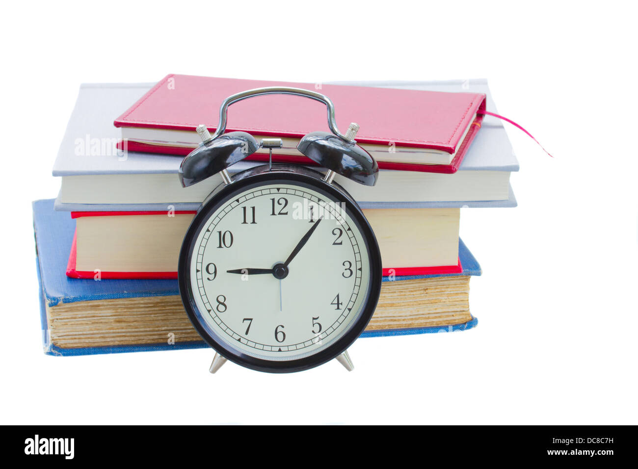 alarm clock with books Stock Photo Alamy