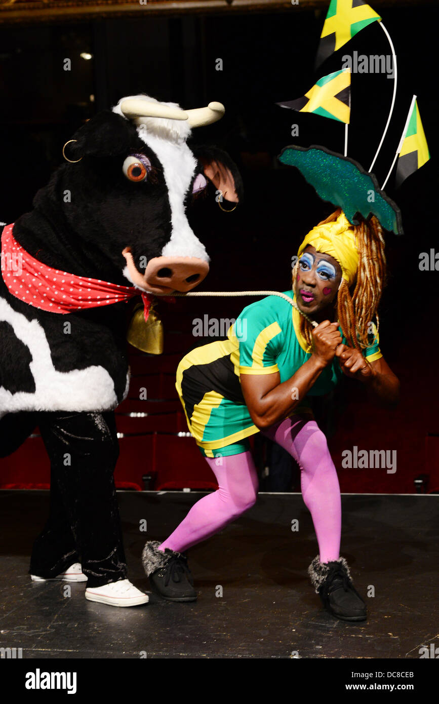 London UK 12th August 2013 : St Joseph's Hospice and Hackney Empire's Dame Dash Photocall with a cast pulling a pantomime cow. Credit:  See Li/Alamy Live News Stock Photo