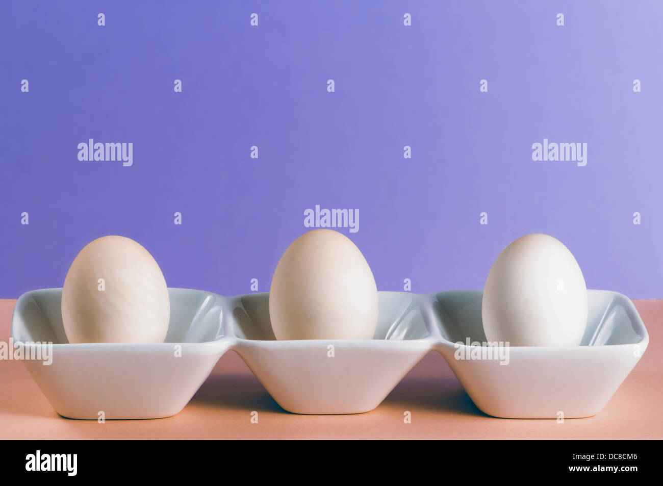 Three duck eggs in a white porcelain dish Stock Photo