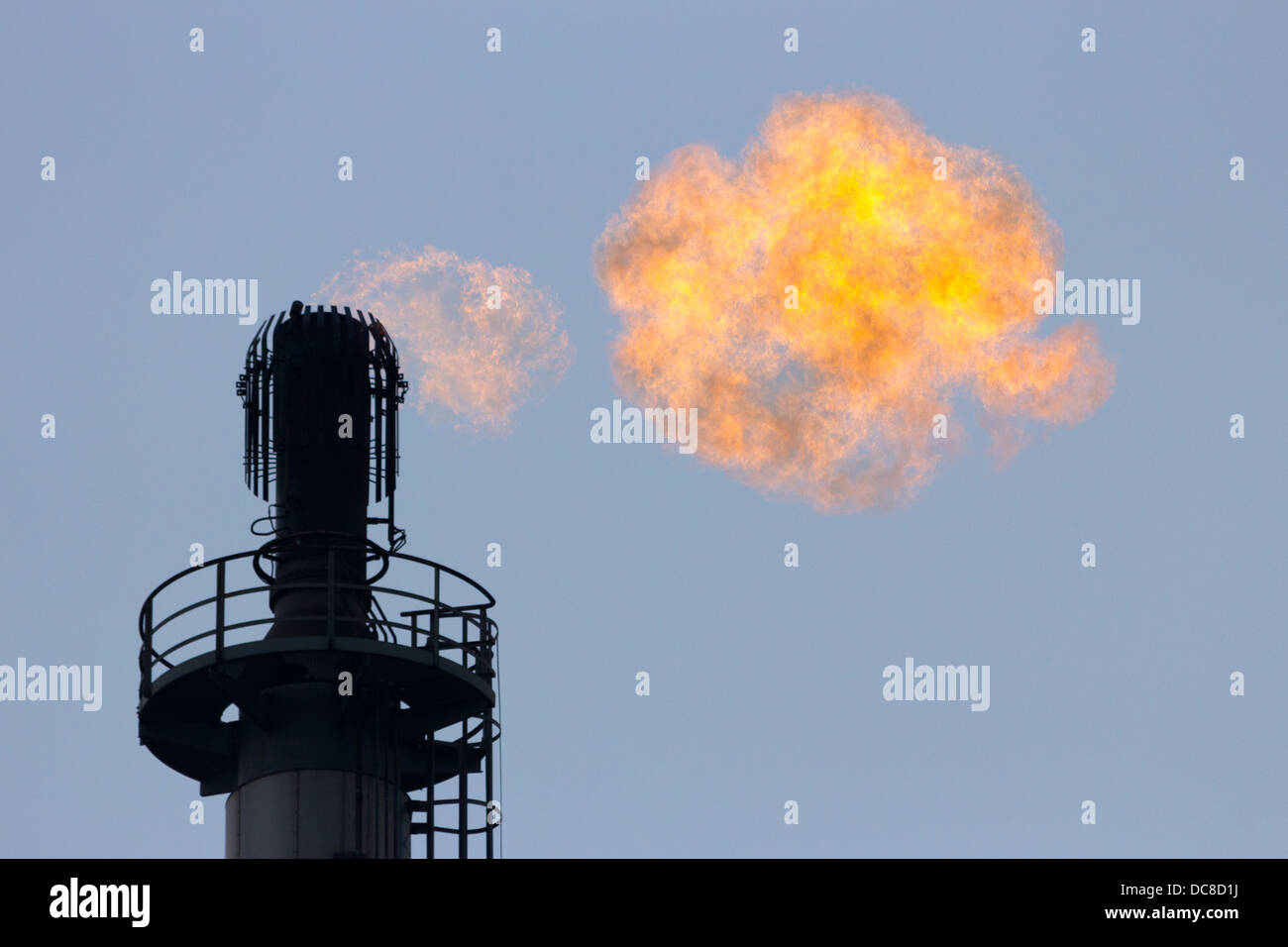 Gas flare at a refinery Stock Photo