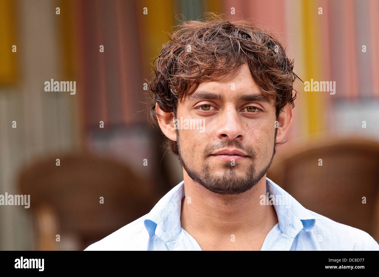 Afghan male student with vivid green eyes Stock Photo