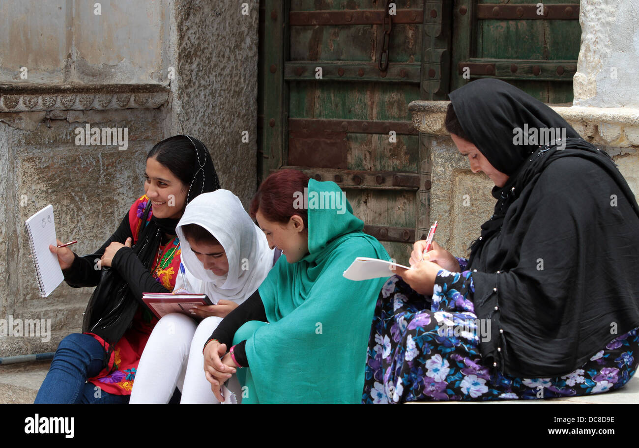 Afghan women sketching in Rajasthan in India Stock Photo