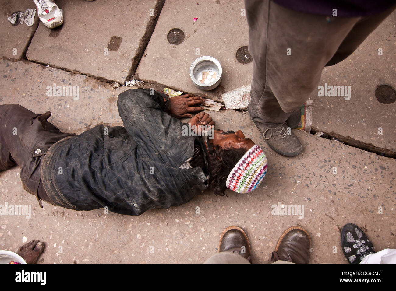 beggar crawls along the floor in Ajmer, Rajashan in India Stock Photo