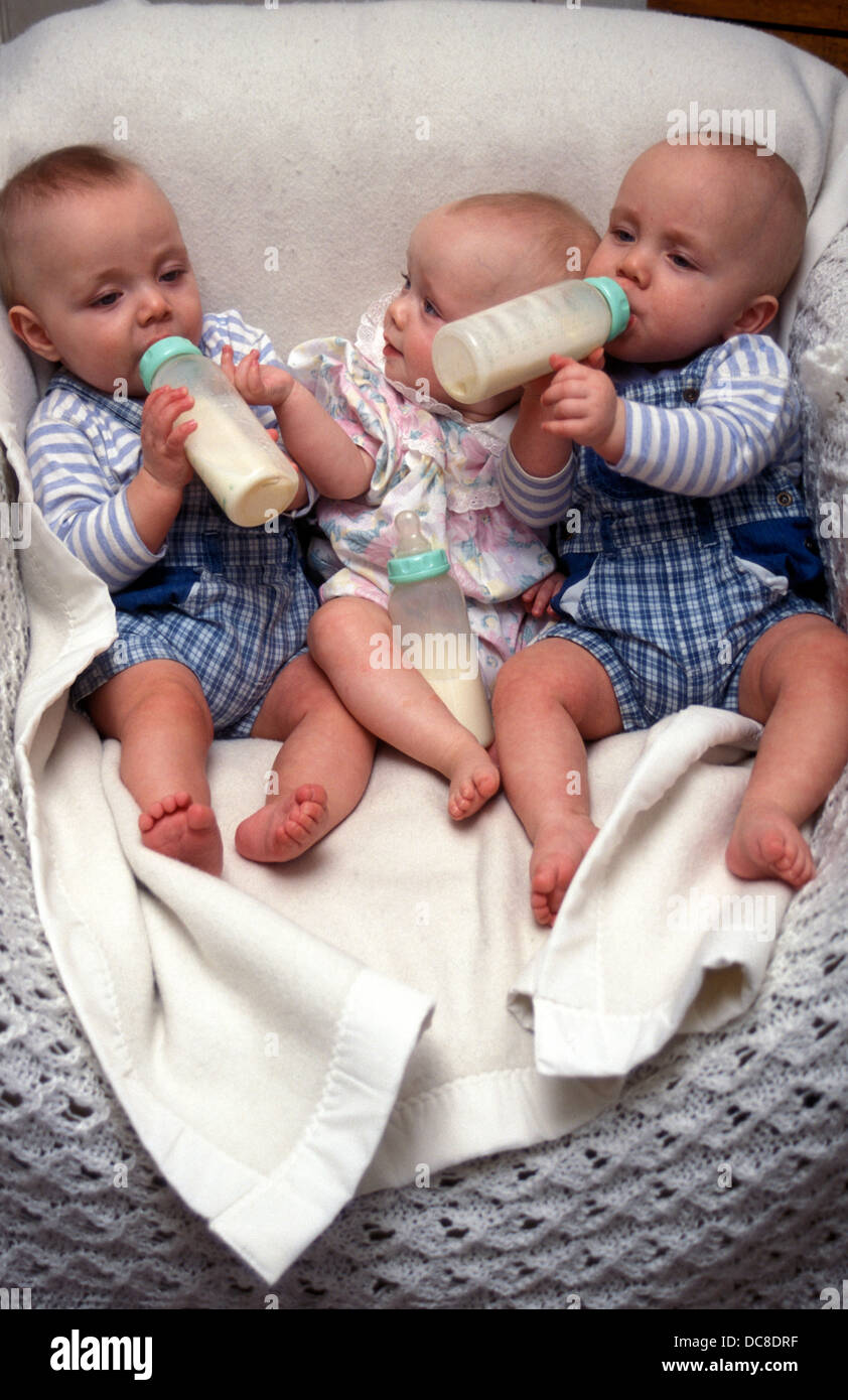 Babies triplets hi-res stock photography and images - Alamy