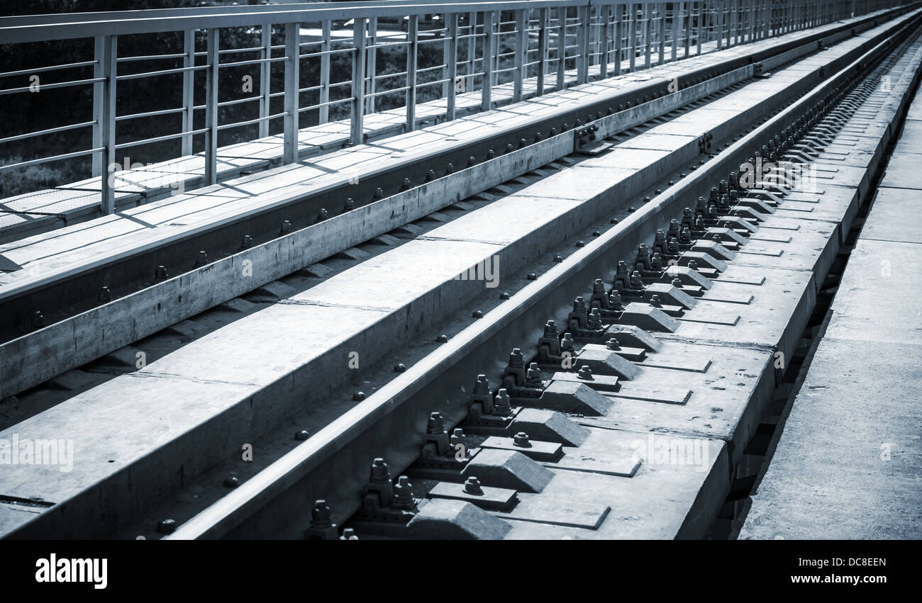 Railway bridge details closeup photo with perspective Stock Photo - Alamy