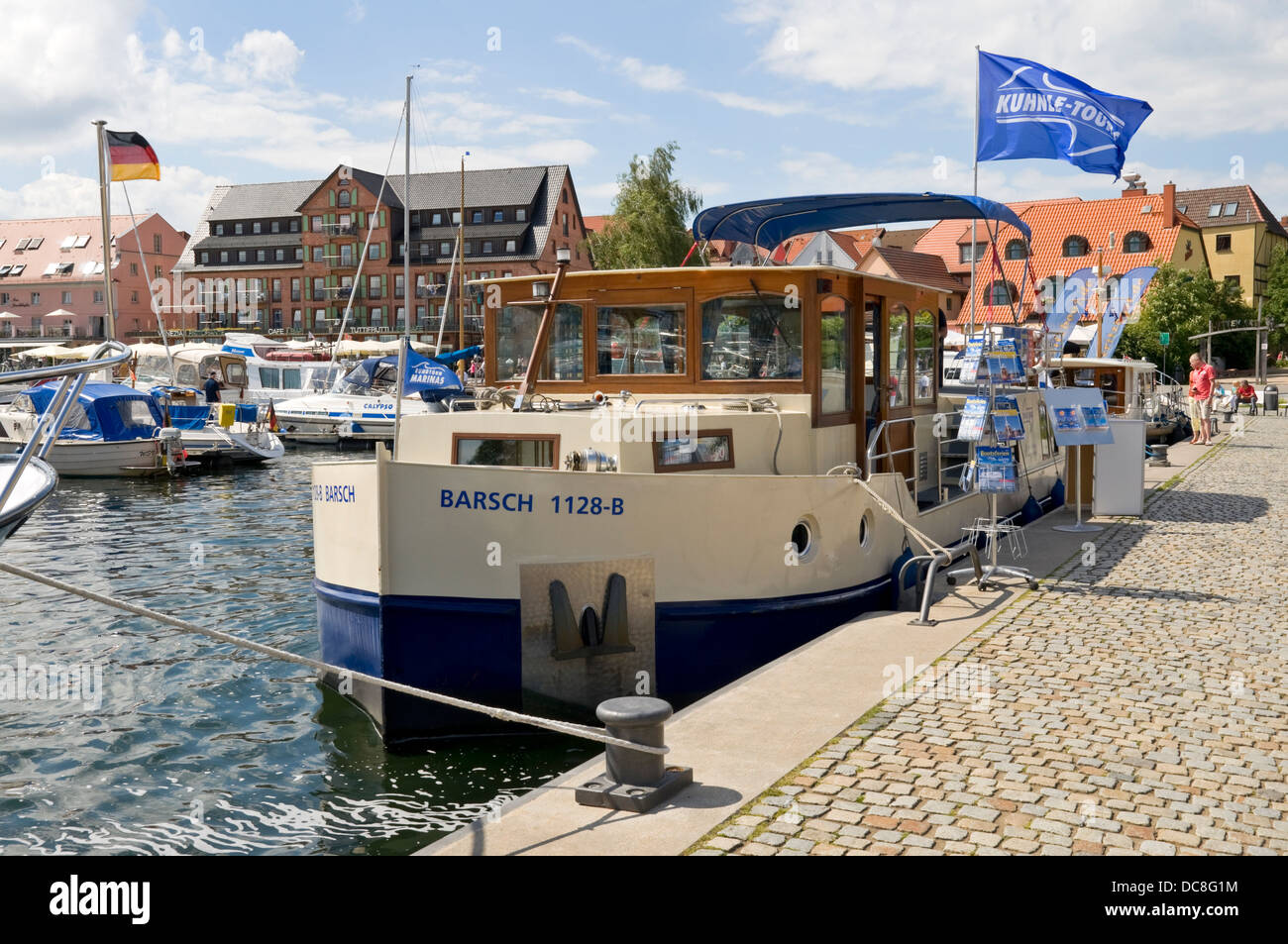 Houseboat in the inner harbour at Waren Müritz, Mecklenburg, Germany