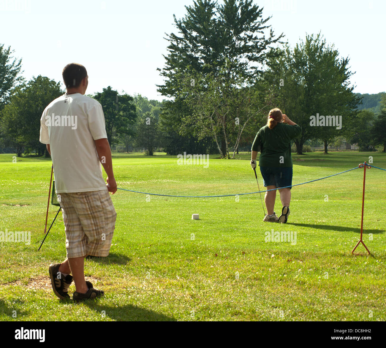 people beginning a game of golf Stock Photo