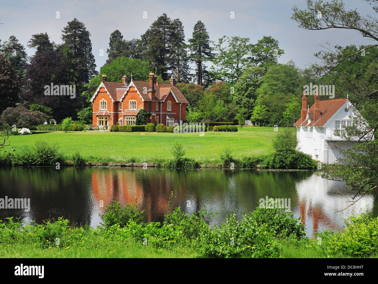 Lakeside House in Windsor Great Park with Woodland behind Stock Photo