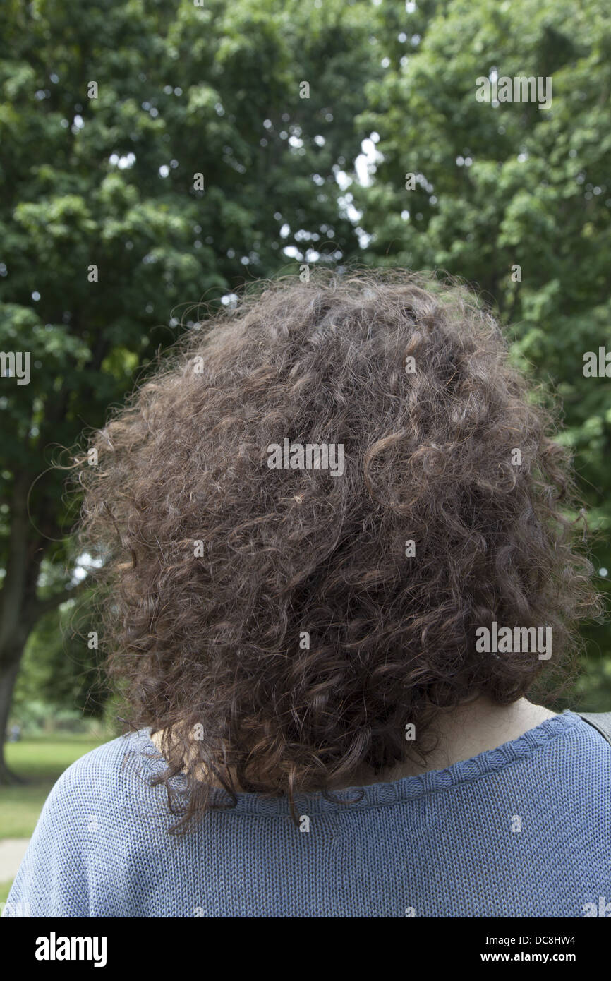 Woman with curly hair Stock Photo