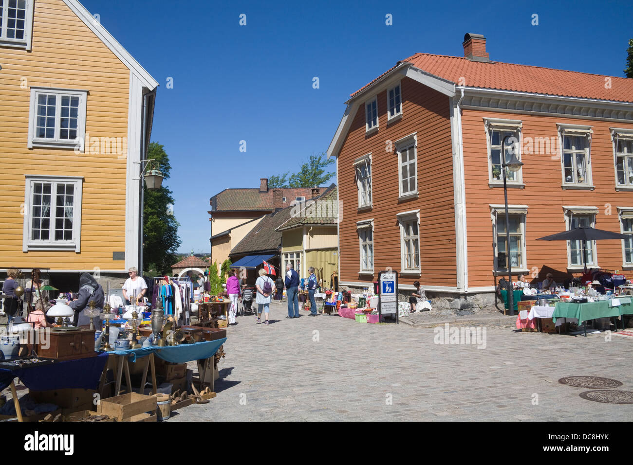 Gamlebyen Fredrikstad Ostfold Norway Customers viewing stalls weekly market in Historic Torvet central square old fortified city Stock Photo