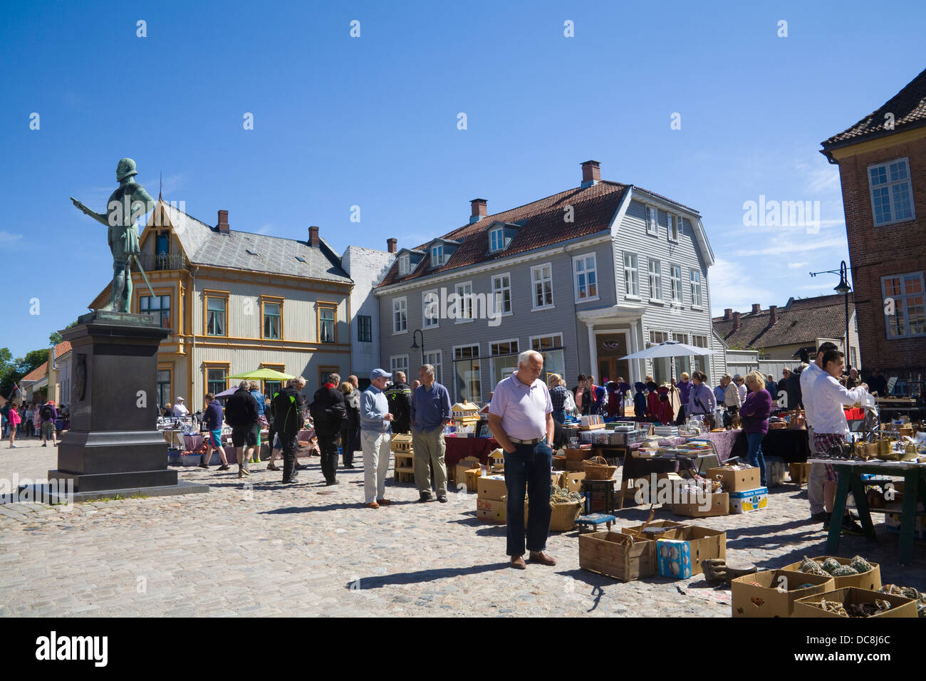 Gamlebyen Fredrikstad Ostfold Norway  Customers viewing stalls at market in Historic Torvet central square old fortified city Stock Photo