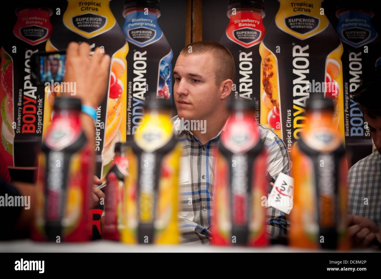 Manhattan, New York, USA. 12th Aug, 2013. Los Angeles Angels of Anaheim outfielder MIKE TROUT speaks with the media at Foley's NY Pub & Restaurant on 33rd Street, Monday, August 12, 2013. Credit:  Bryan Smith/ZUMAPRESS.com/Alamy Live News Stock Photo