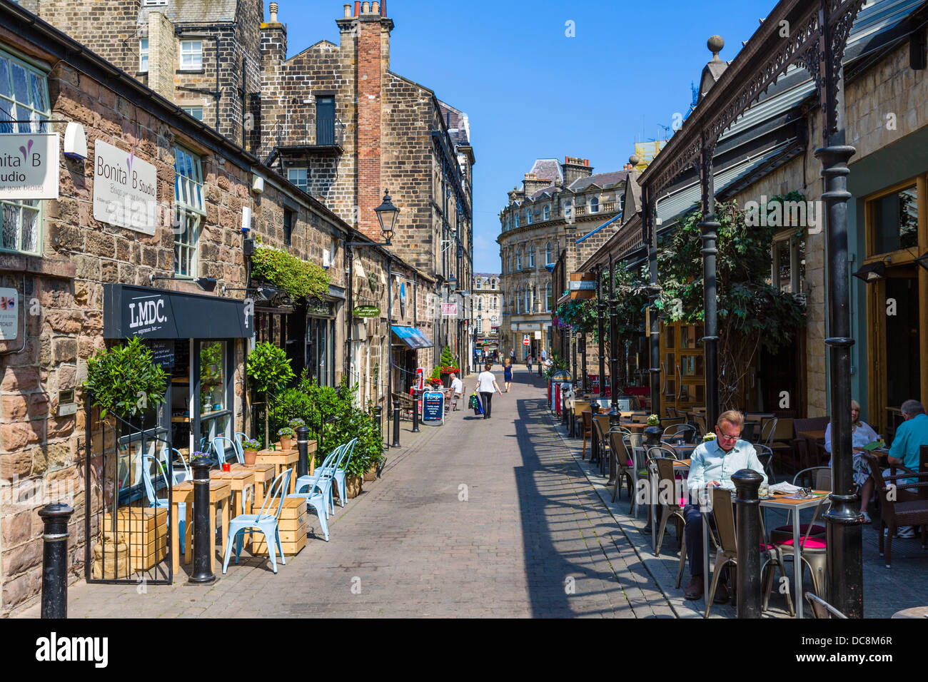 Cafes, bars and restaurants on John Street in the old town centre, Harrogate, North Yorkshire, England, UK Stock Photo