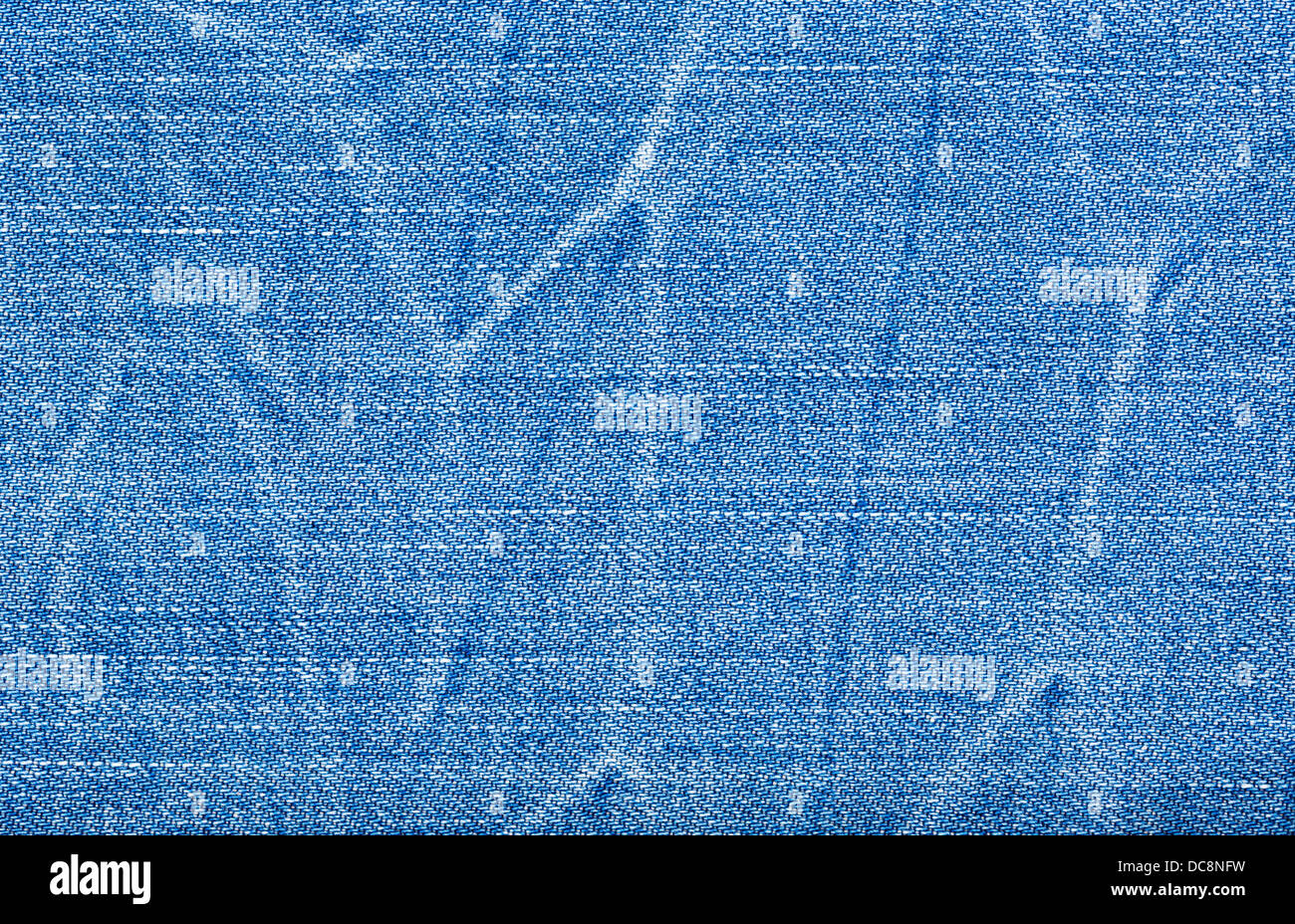 Light Blue Washed Faded Denim Fabric Texture Swatch Stock Photo ...