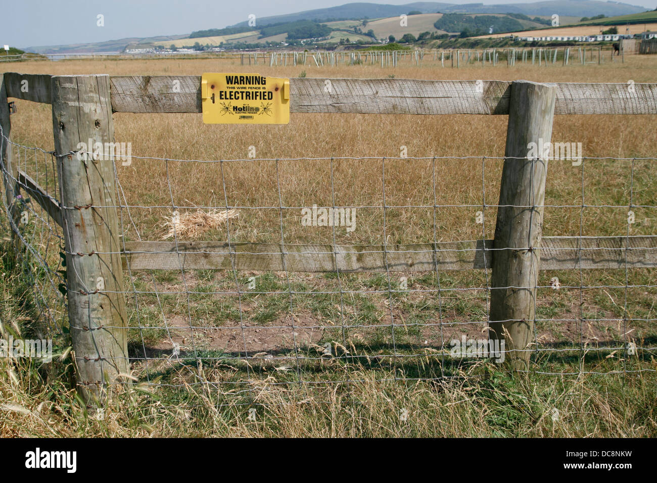 Electrified Fence Watchet Somerset England UK Stock Photo