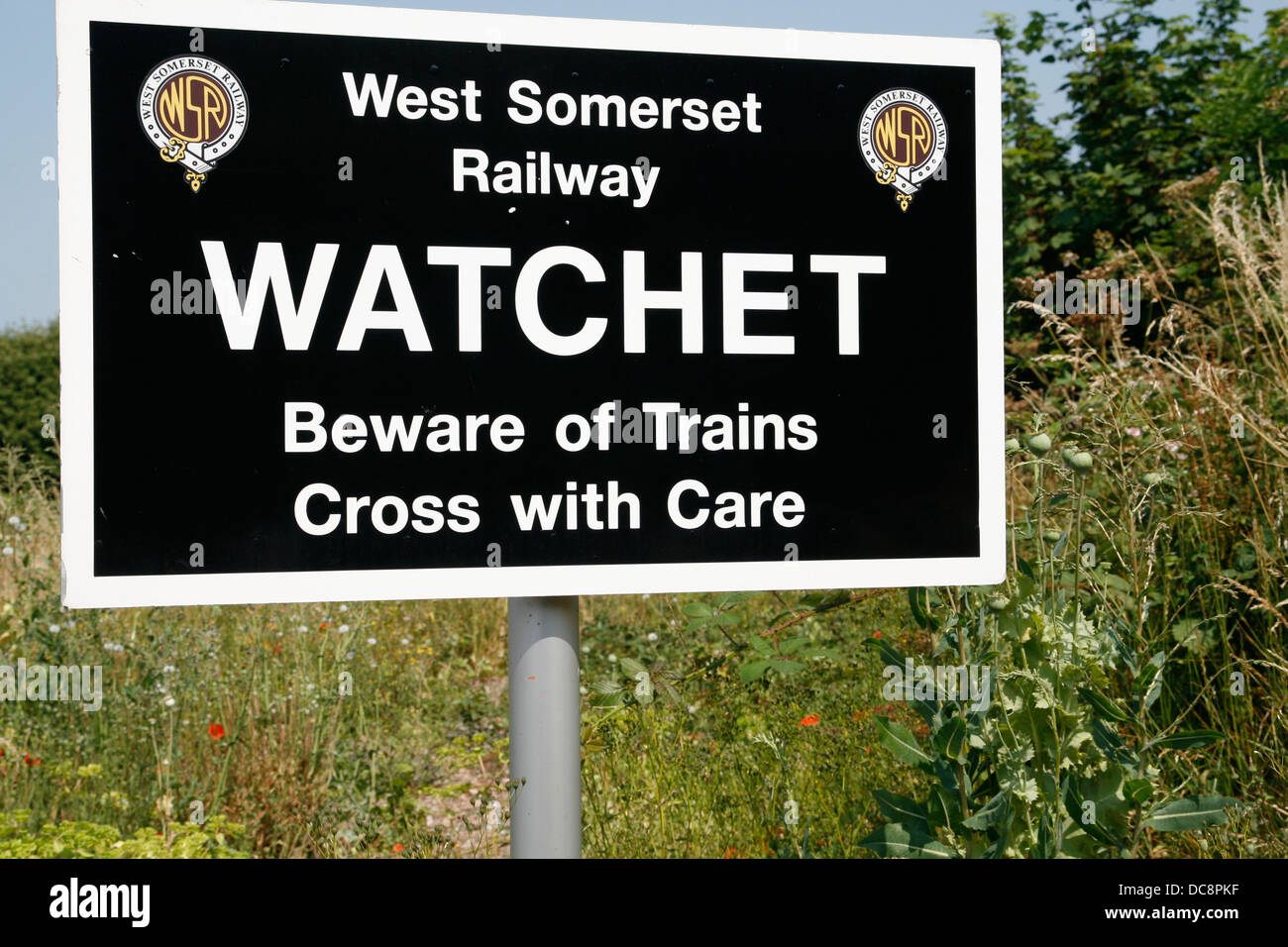 Beware of Trains level crossing notice West Somerset Railway Watchet Somerset England UK Stock Photo