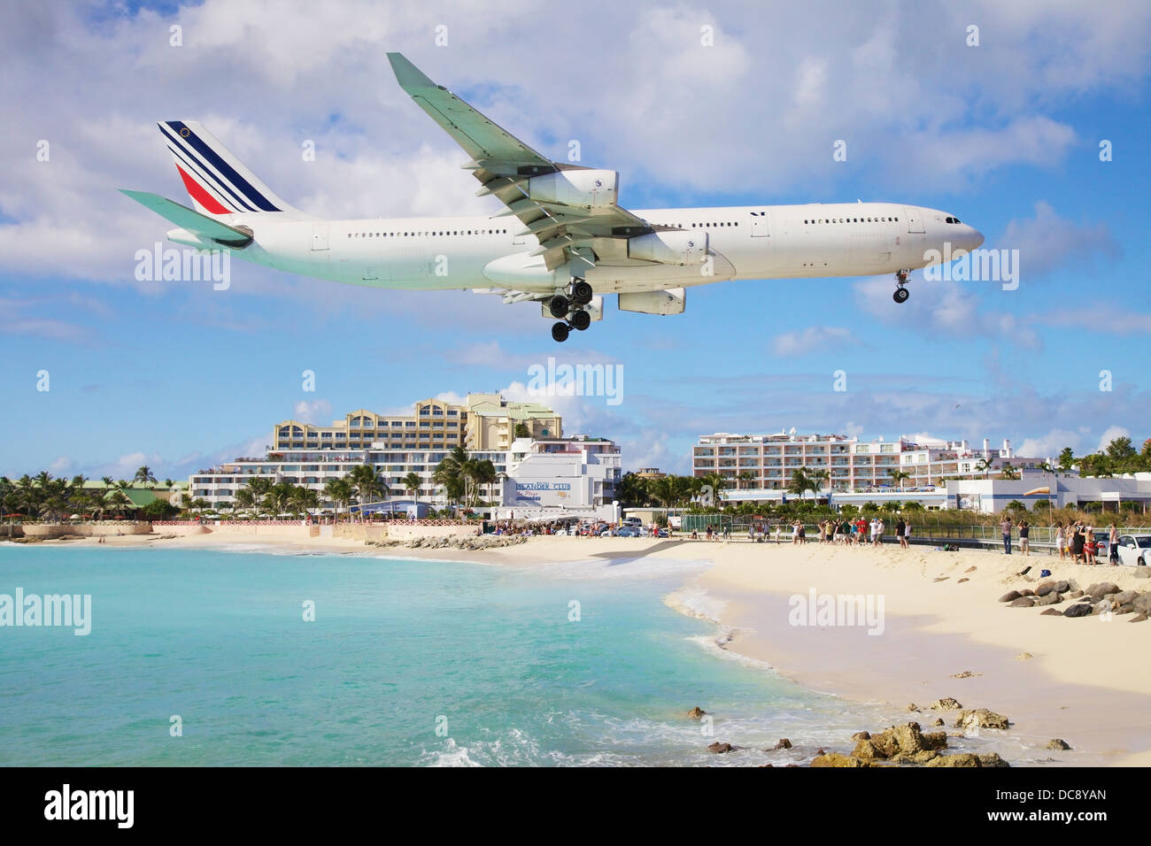 Airplane over Maho Beach; Sint Maarten, Dutch West Indies Stock Photo
