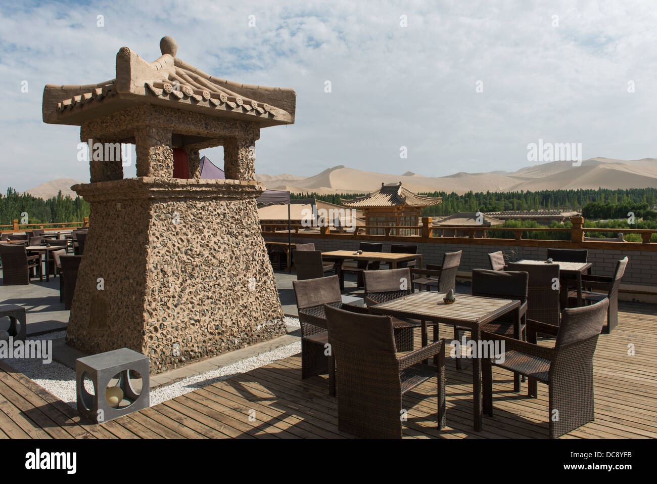 Seating on an outdoor patio at Dun Huang Silk Road Hotel; Jiuquan, Gansu, China Stock Photo