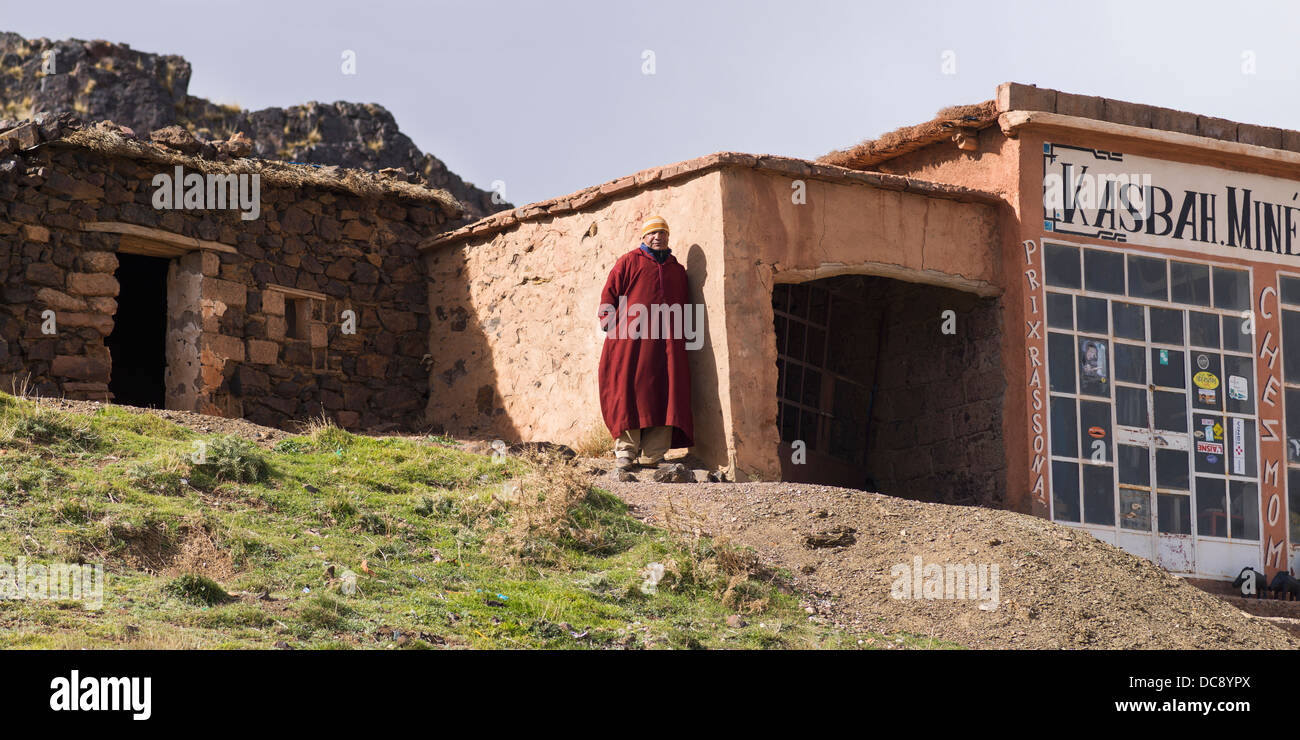 A man stands outside a shop; Morocco Stock Photo