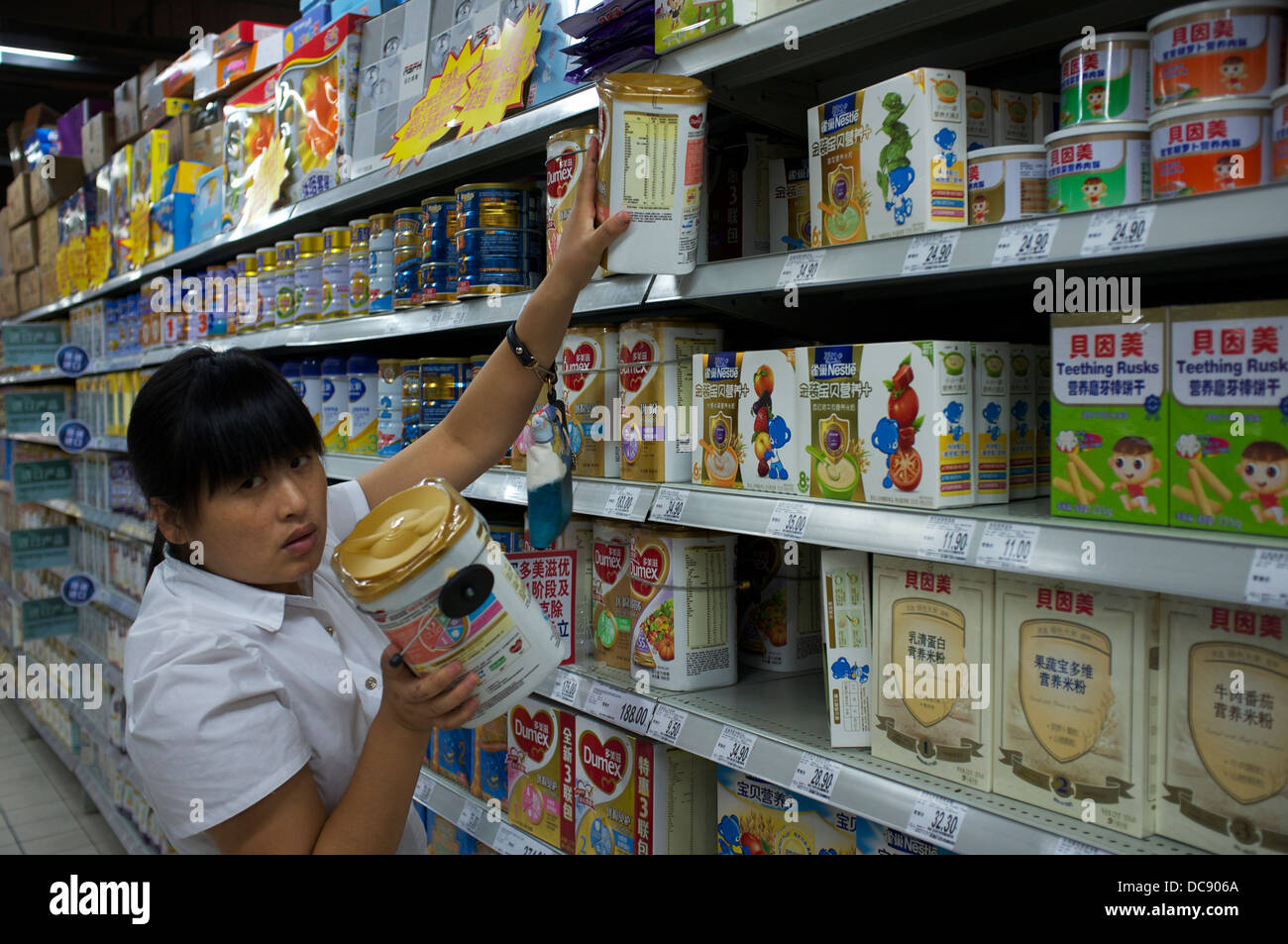Stacking shelves supermarket hires stock photography and images Alamy
