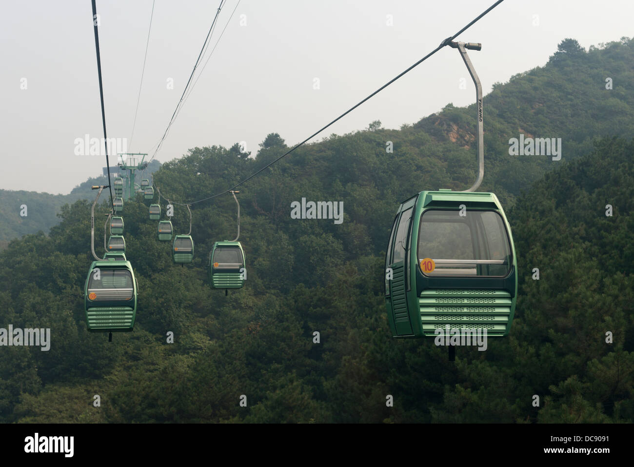 Aerial tram going up to the Great Wall of China; Beijing, China Stock Photo