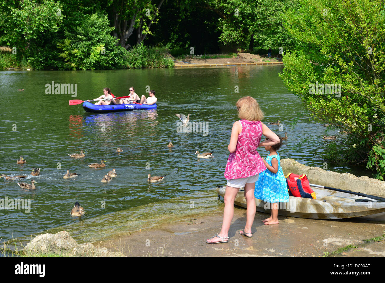 Group kayaking on River Thames, Pangbourne, Berkshire, England. United