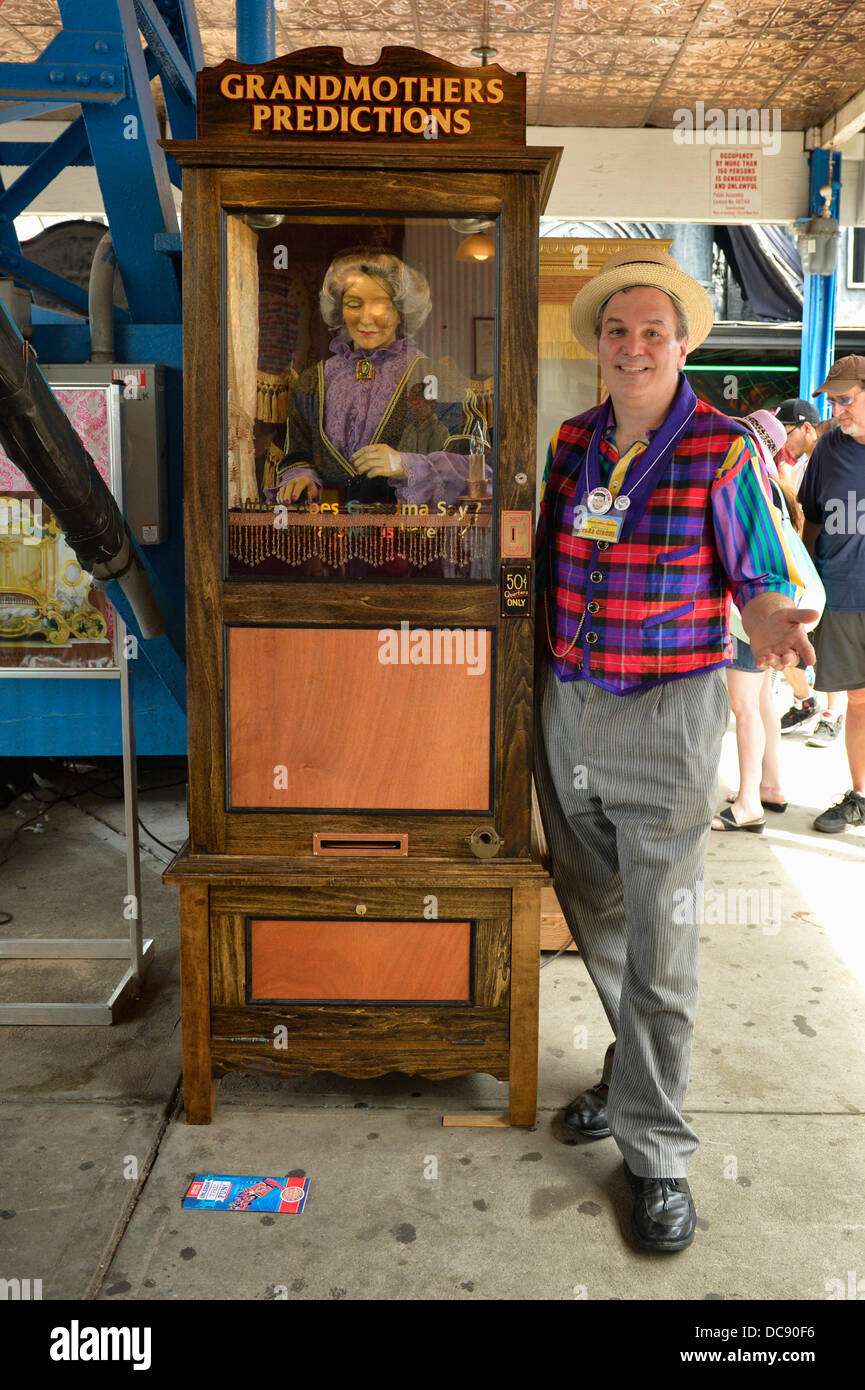 Brooklyn, New York, USA. 10th August 2013. At Coney Island, BOB YORBURG, AKA Professor Phineas FeelGood, of Yorktown Heights, is at Grandmothers Predictions, the world famous fortune telling game he restored after it was damaged during Hurricane Sandy, in October 2012. At 3rd Annual Coney Island History Day celebration. Stock Photo
