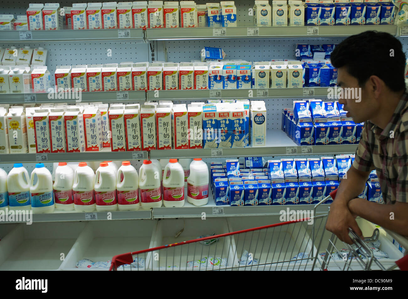 Milk products in a Carrefour supermarket in Beijing, China. 2013 Stock Photo