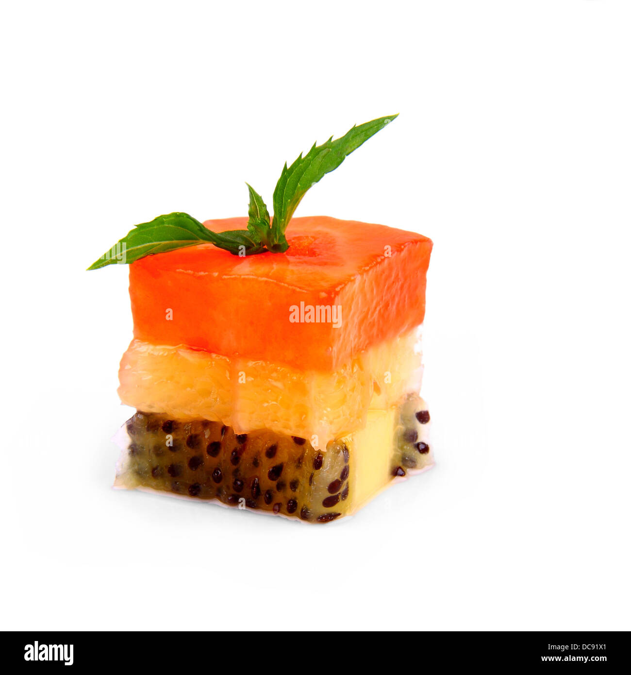 Dessert fruit cubes of strawberry, orange and kiwi Stock Photo