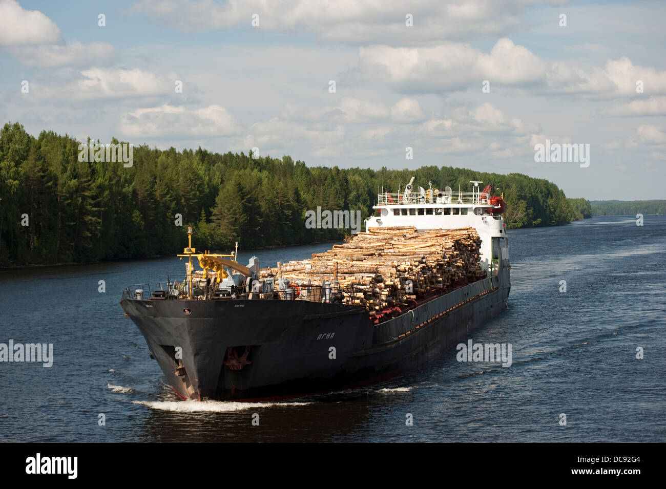 Timber cargo ship in Svir River Volga-Baltic Waterway Russia Stock Photo