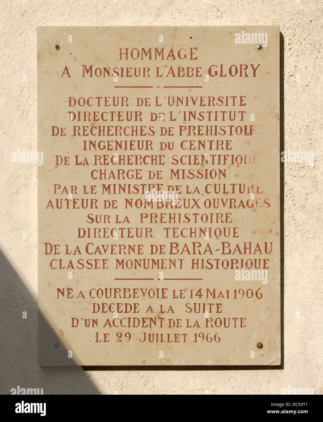Tribute to Abbot André Glory, at the entrance of the Bara-Bahau prehistoric cave in Le Bugue, Dordogne, France. Stock Photo