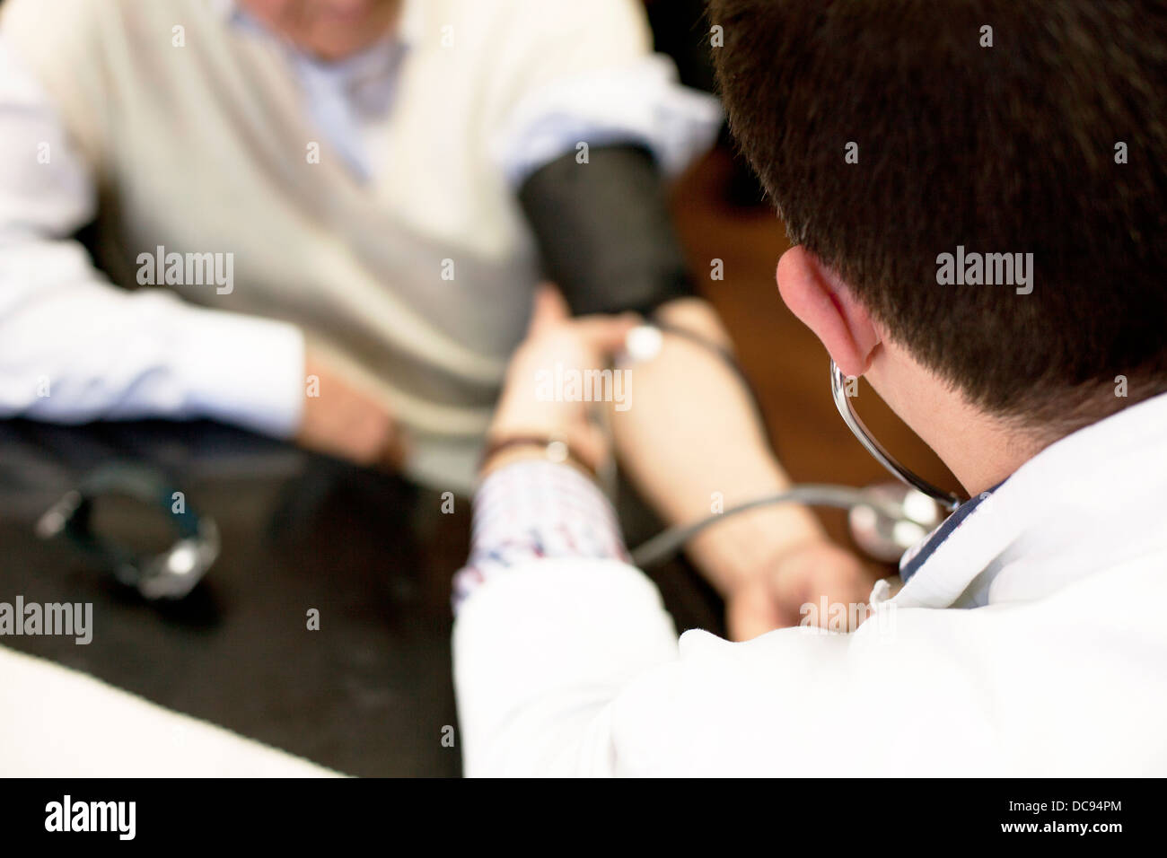 Human hand holding blood pressure gauge hi-res stock photography and ...