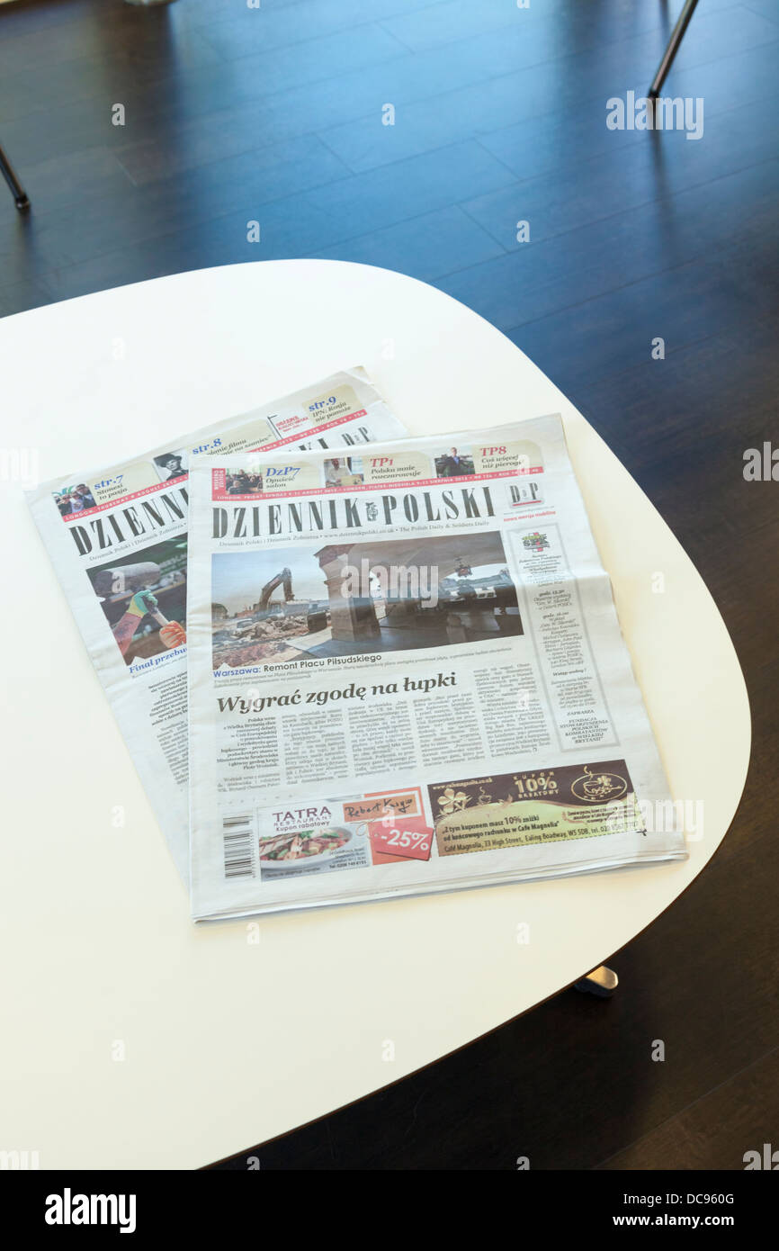 Two copies of Dziennik Polski. Polish newspapers on a table Stock Photo