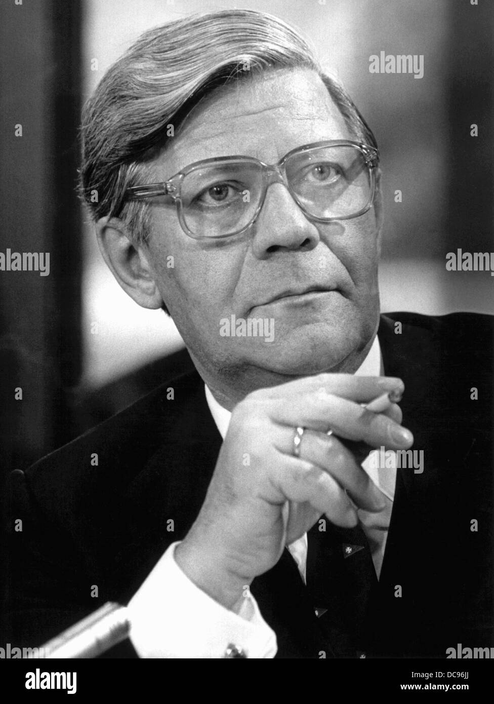 German chancellor Helmut Schmidt, typically with cigarette, during a press conference on the 19th of October in 1978 in Bonn. Stock Photo
