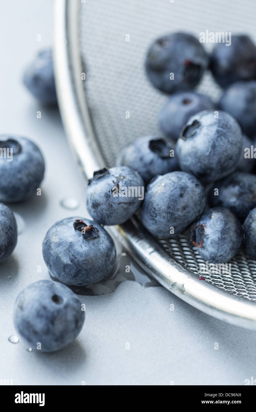 Blueberries in strainer, selective focus Stock Photo