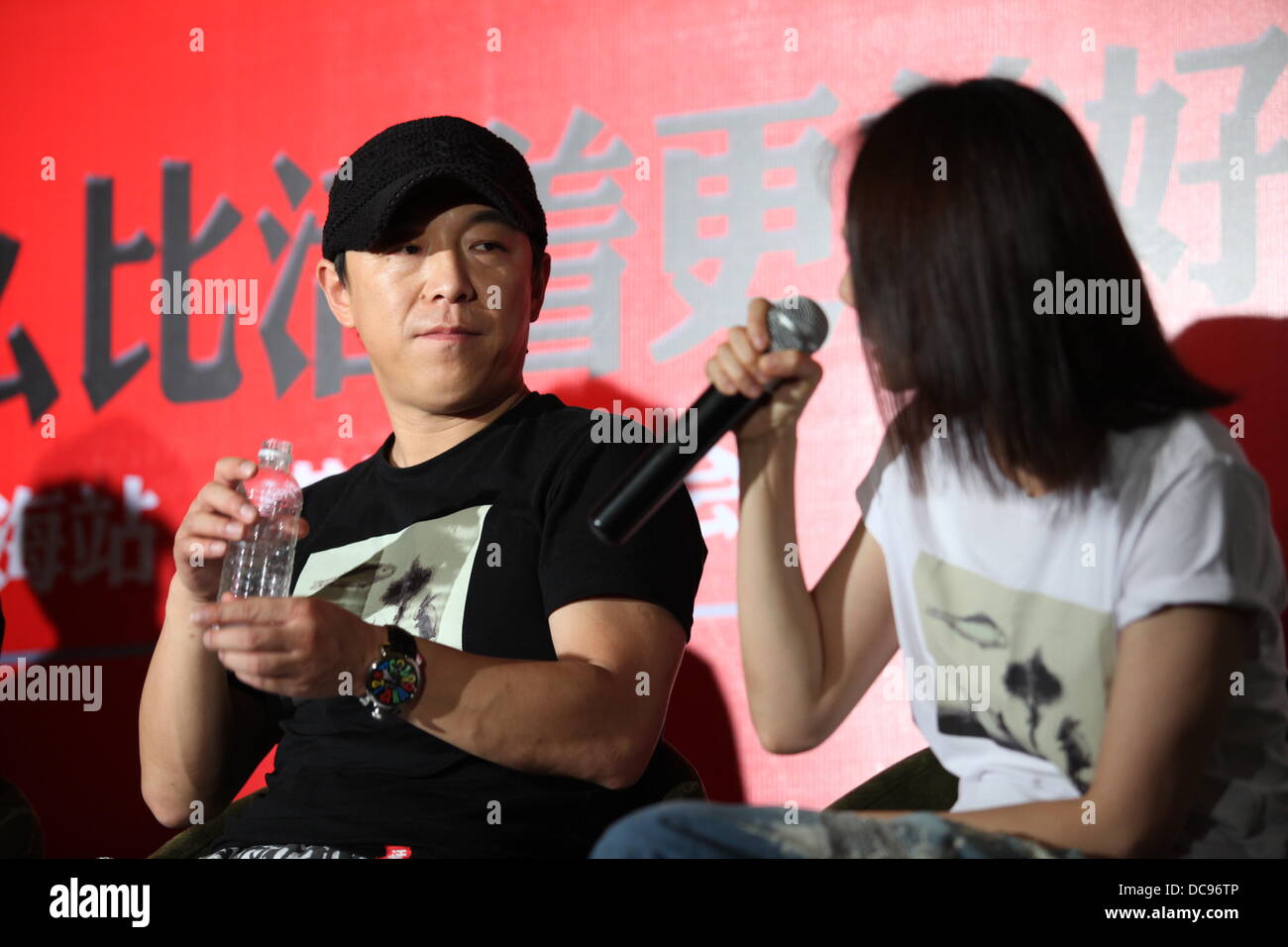 Shanghai, China. 12th Aug, 2013. Actor Huang Bo and actress Yuan Quan attend the press conference of their modern drama To Live in Shanghai, China on Monday August 12, 2013. Credit:  TopPhoto/Alamy Live News Stock Photo