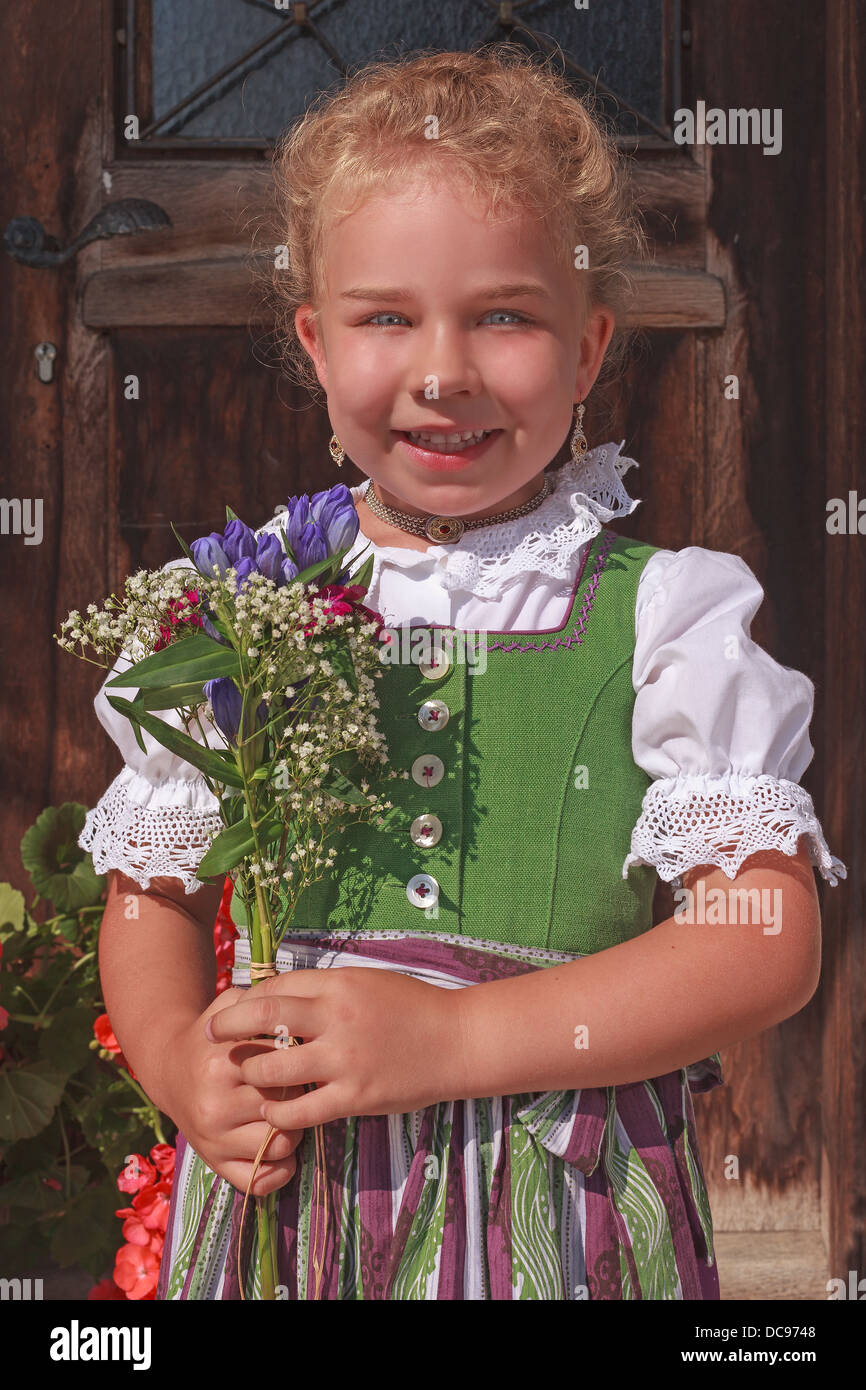 Portrait of a Bavarian flower girl Stock Photo