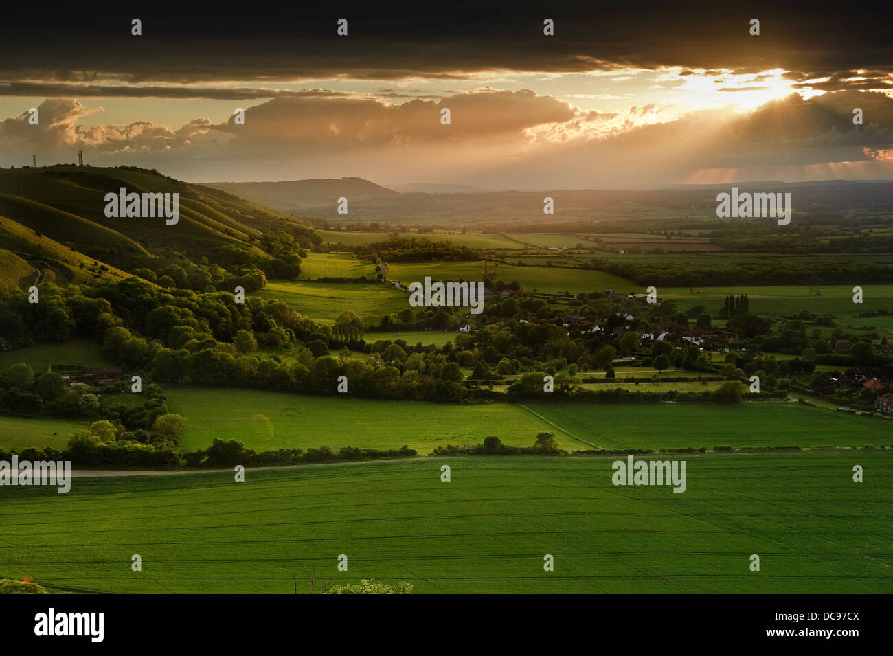 Landscape over English countryside landscape in Summer sunset Stock Photo