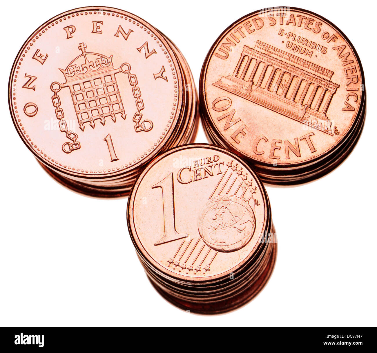 British pennies; American 1c pieces; Euro 1c pieces. Stock Photo